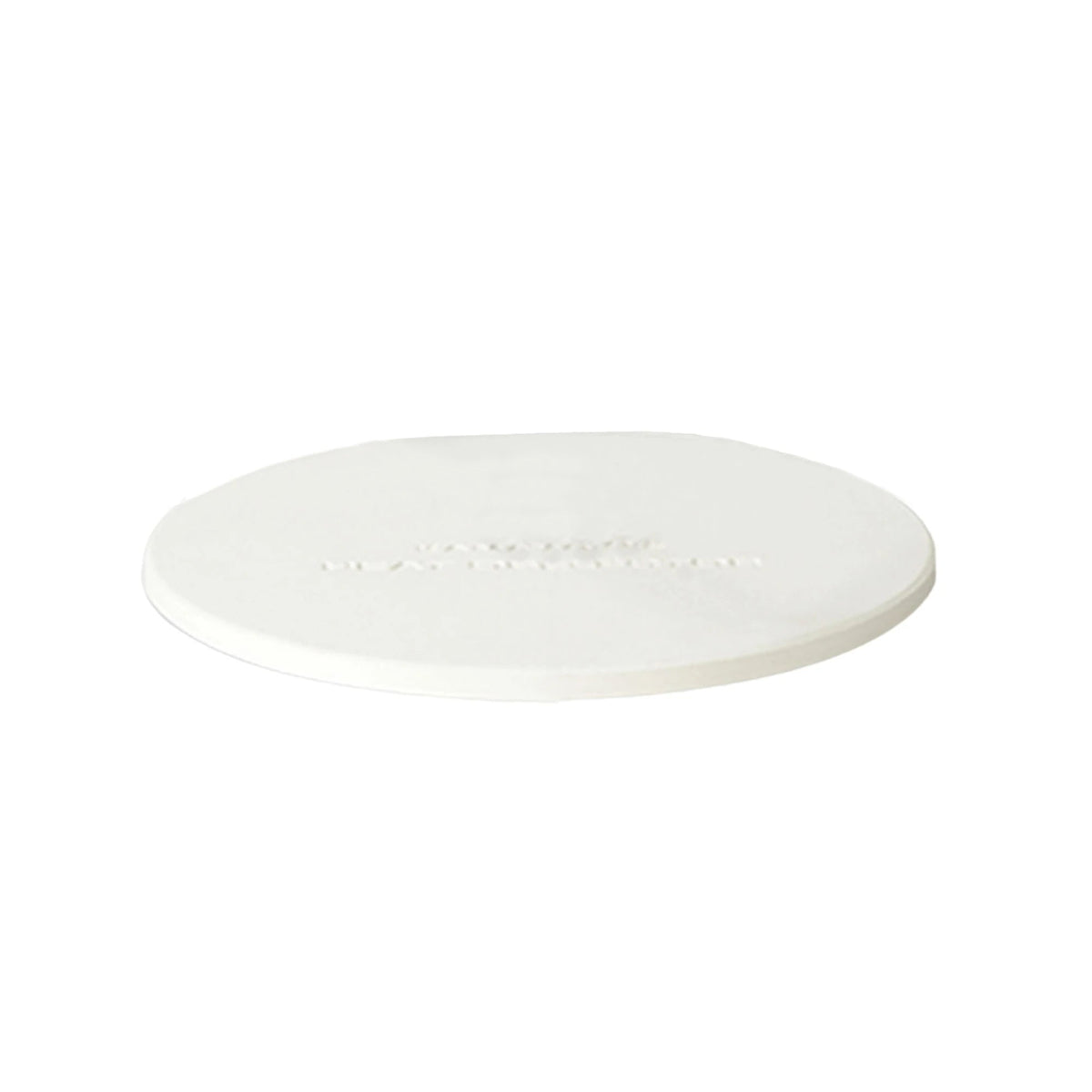 Round white heat deflector with the words "Kamado Joe Heat Deflector" embossed on the top